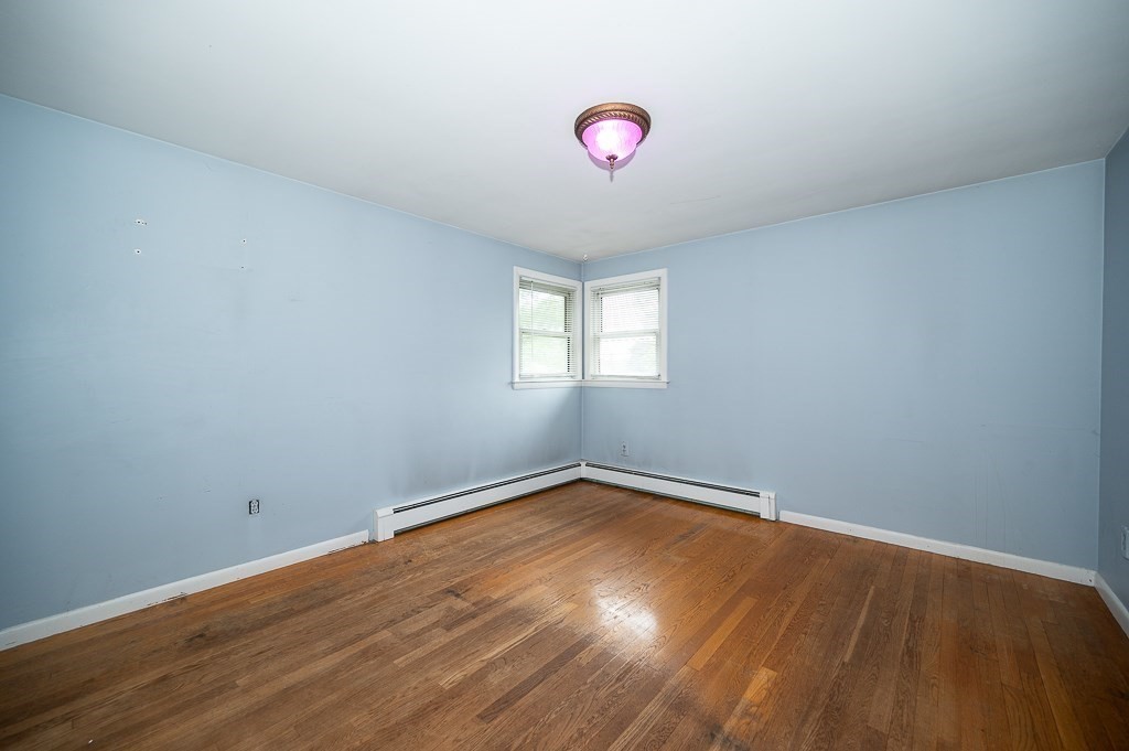 3 Sears Avenue Webster, MA 01570 - Photo 14 of 27 a view of a room with wooden floor and windows