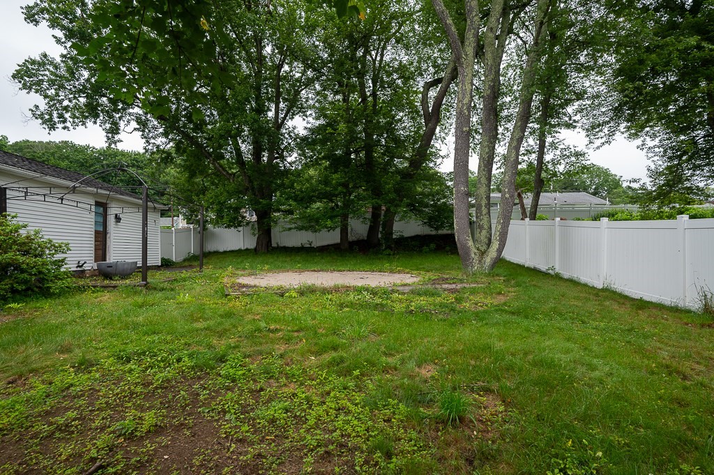3 Sears Avenue Webster, MA 01570 - Photo 25 of 27 a view of a backyard with a small cabin