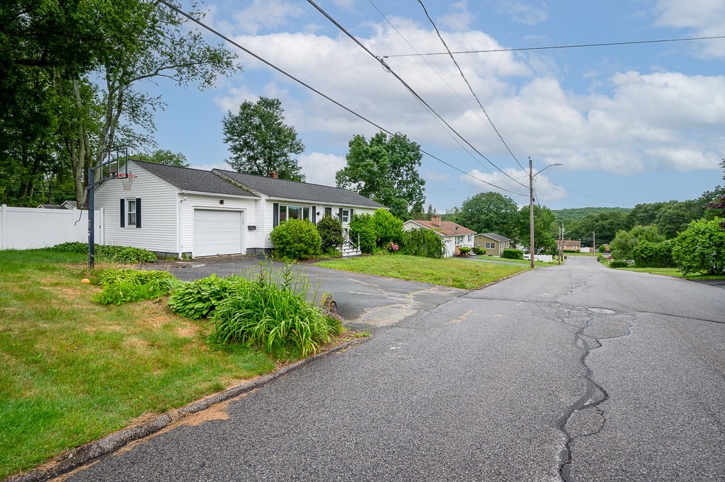 3 Sears Avenue Webster, MA 01570 - Photo 27 of 27 a house view with a garden space