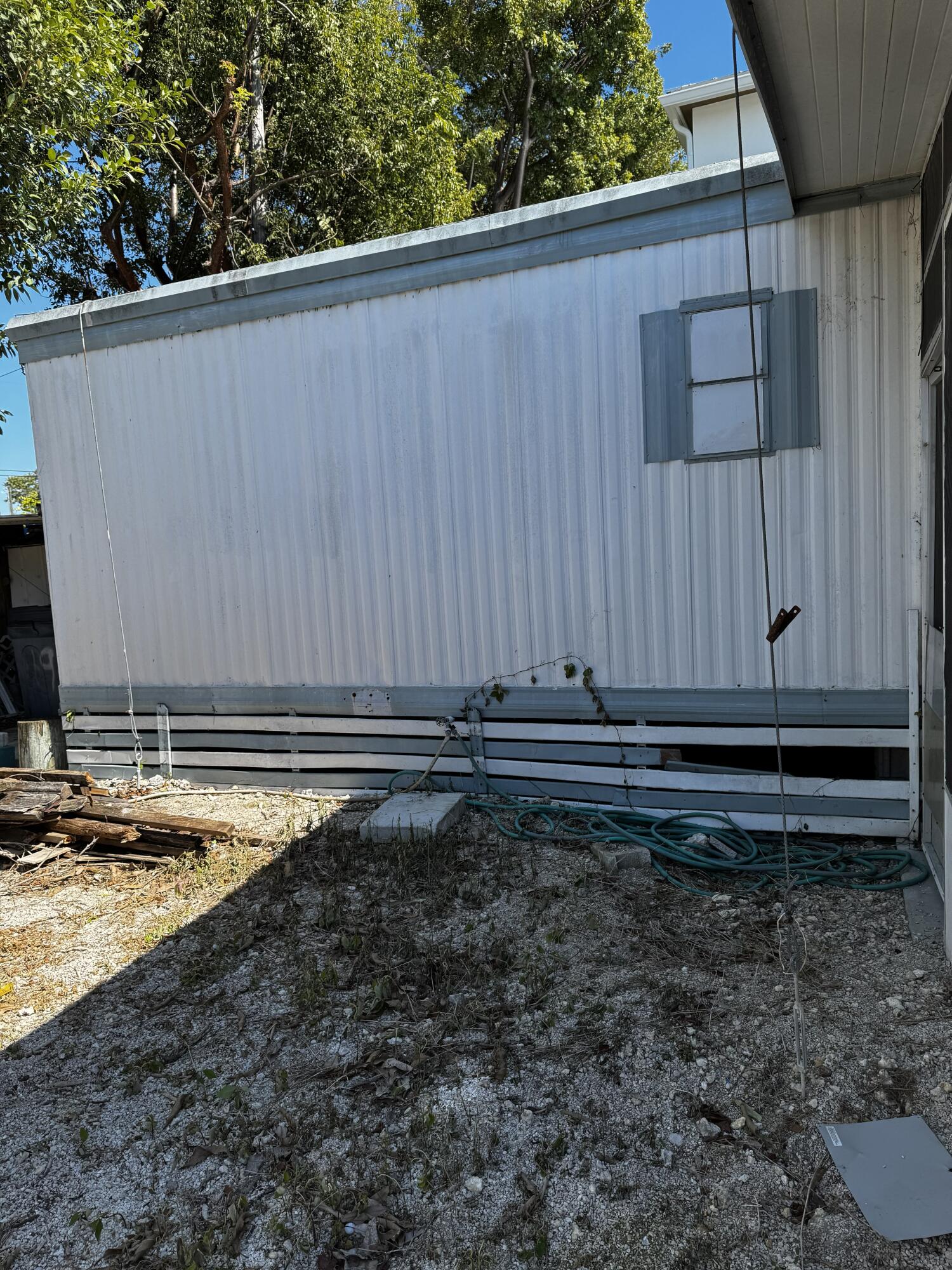 49 1st Court Key Largo, FL 33037 - Photo 30 of 36 Side View Mobile Home 49