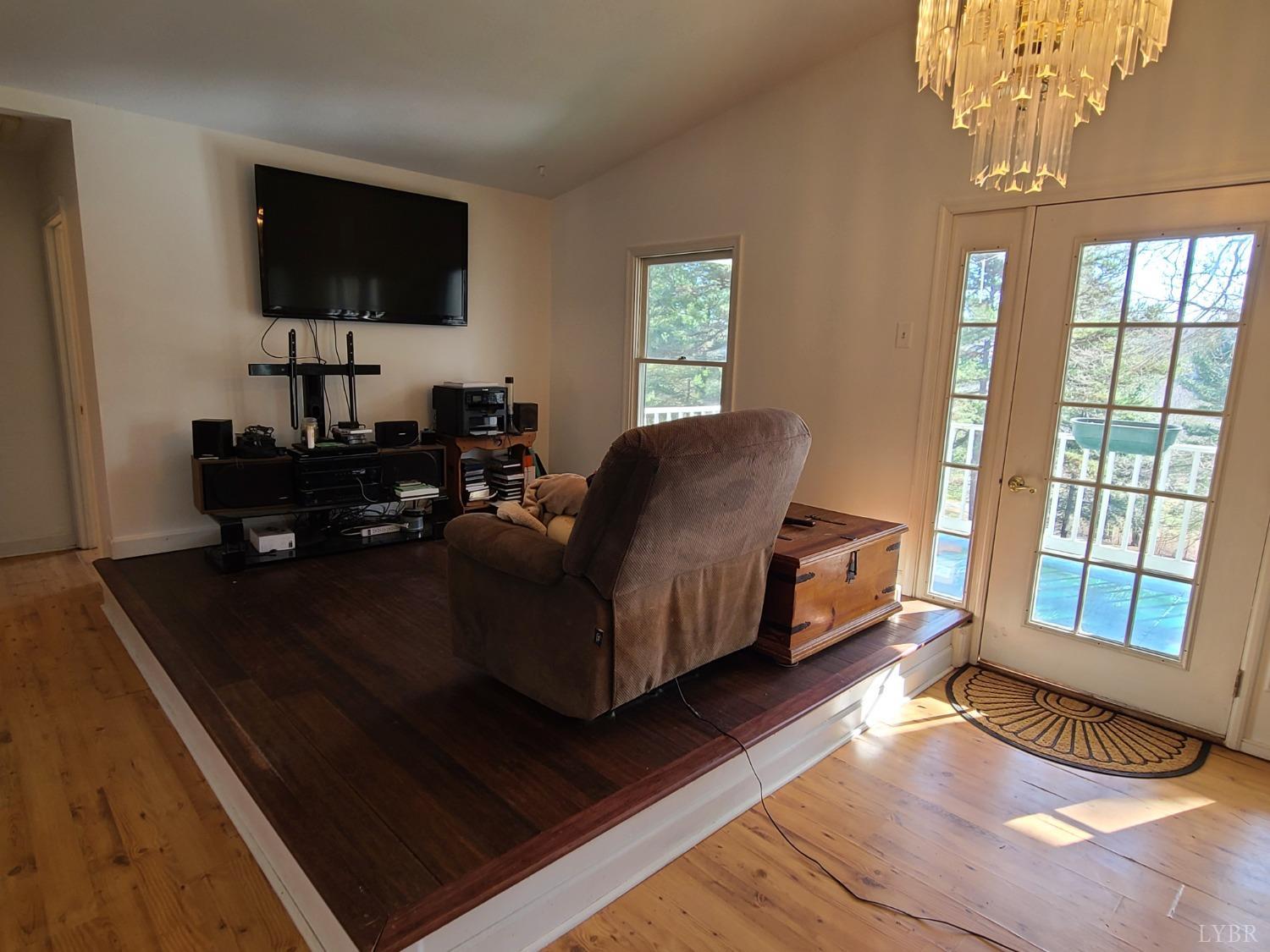 1641 Roark Mill Road Hurt, VA 24563 - Photo 12 of 52 a living room with furniture and a flat screen tv