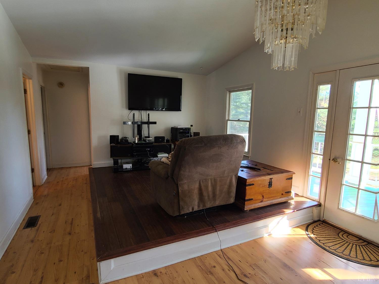 1641 Roark Mill Road Hurt, VA 24563 - Photo 13 of 52 a living room with furniture and a flat screen tv
