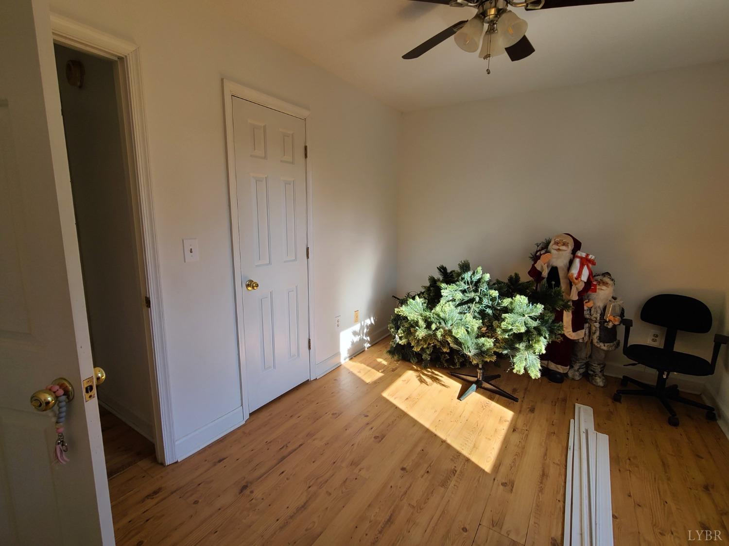 1641 Roark Mill Road Hurt, VA 24563 - Photo 20 of 52 wooden floor in a gallery