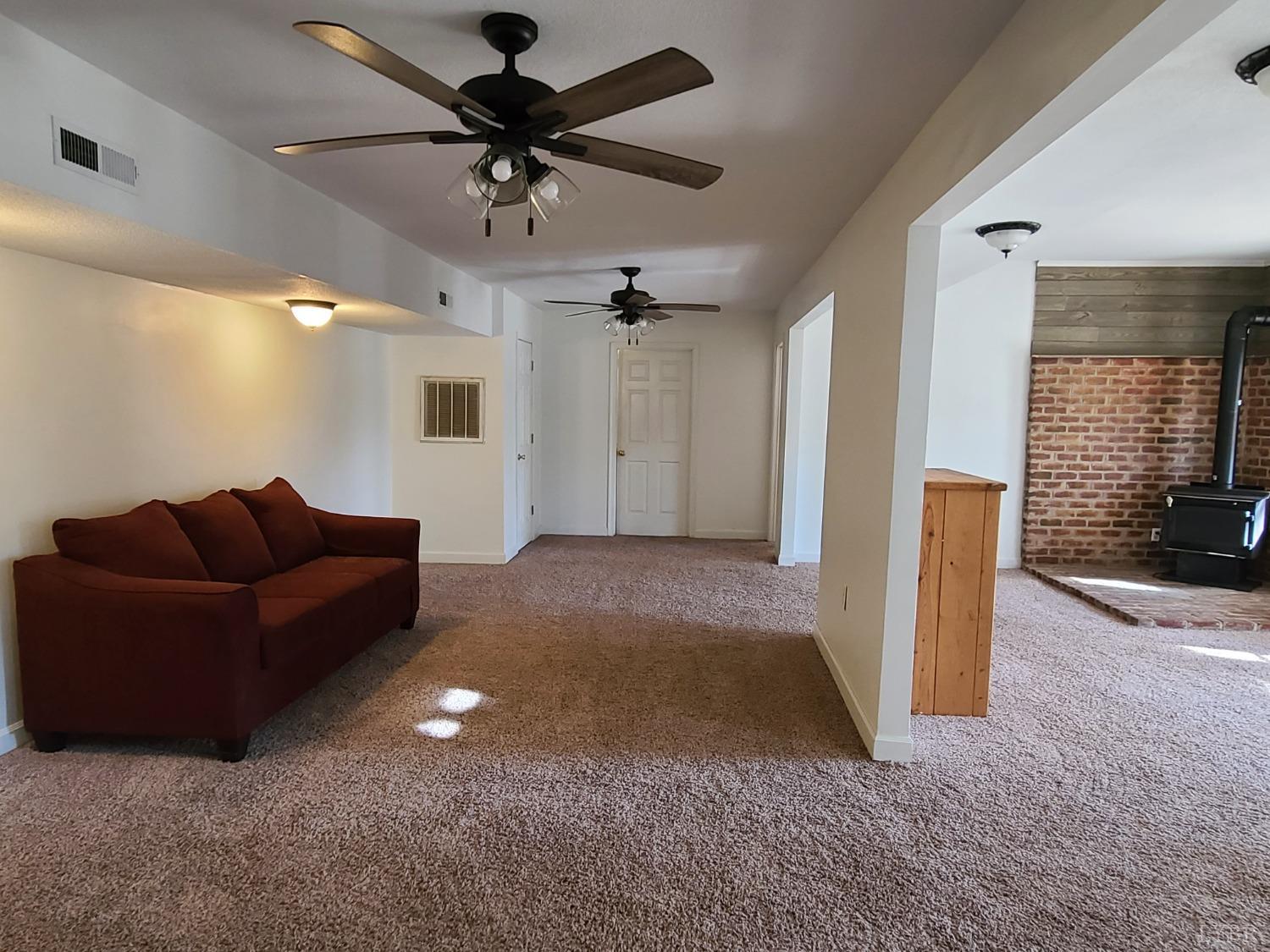1641 Roark Mill Road Hurt, VA 24563 - Photo 29 of 52 a living room with furniture and a ceiling fan
