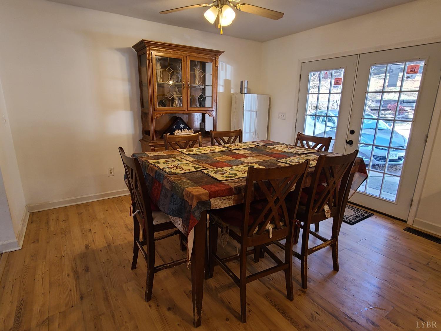 1641 Roark Mill Road Hurt, VA 24563 - Photo 9 of 52 a dining room with furniture and window
