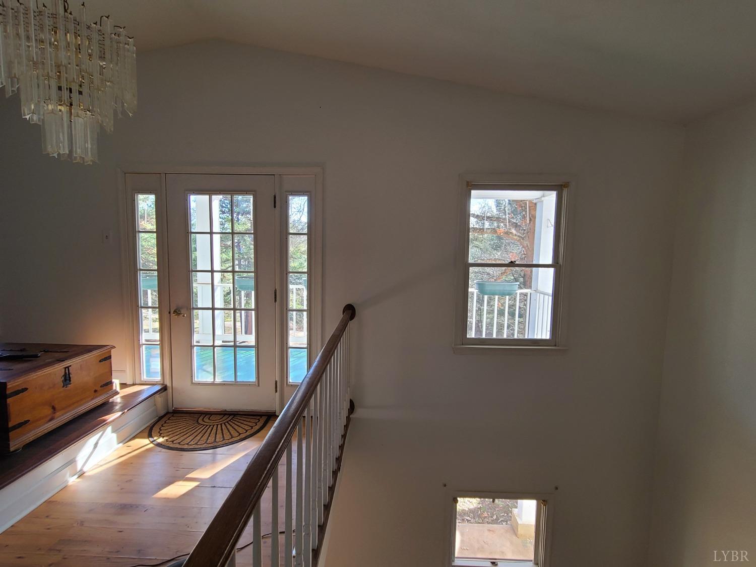 1641 Roark Mill Road Hurt, VA 24563 - Photo 10 of 52 a view of a livingroom with furniture and staircase