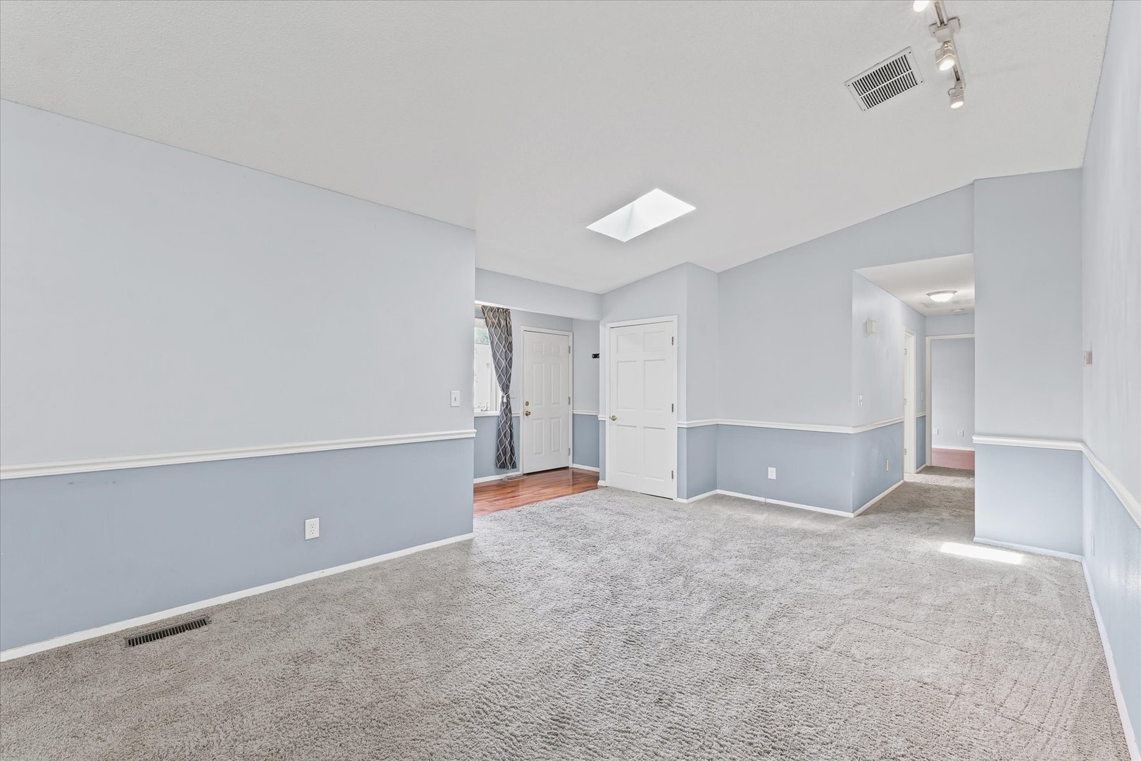 502 Ridge Road Philo, IL 61864 - Photo 5 of 28 a view of an empty room with a window