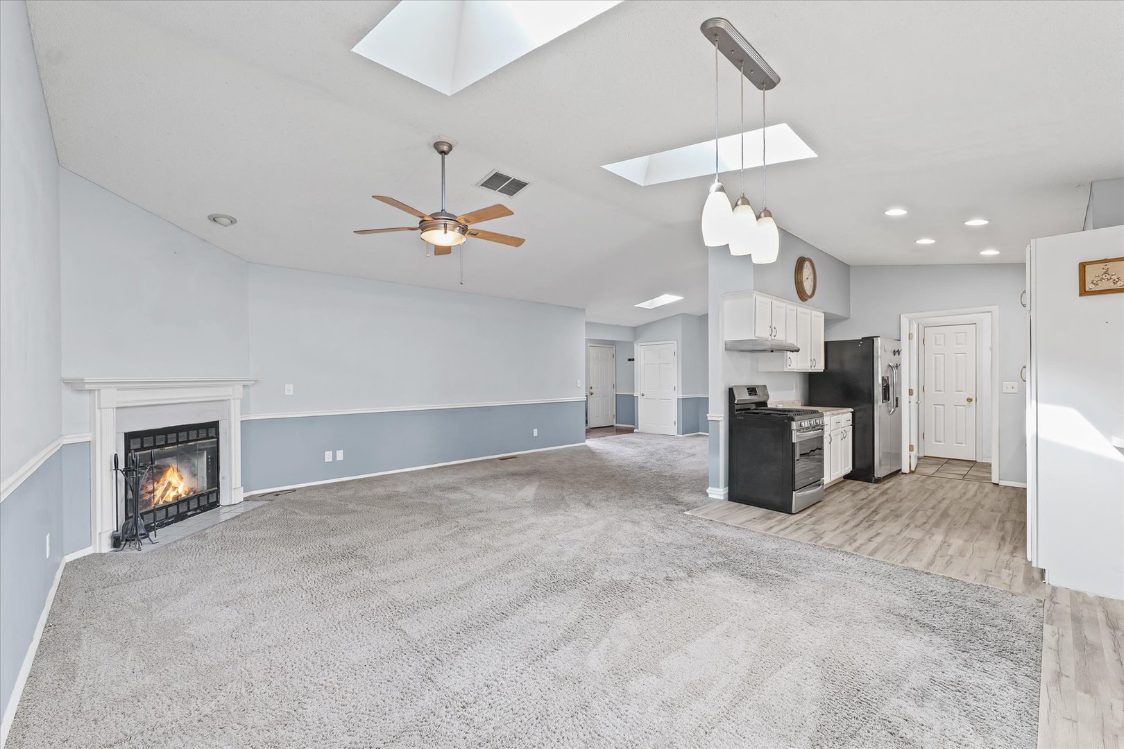 502 Ridge Road Philo, IL 61864 - Photo 8 of 28 a view of an empty room with a fireplace