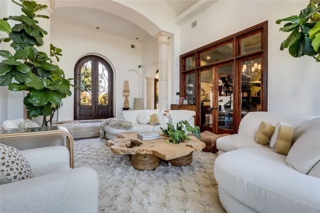 a view of a livingroom with furniture and window