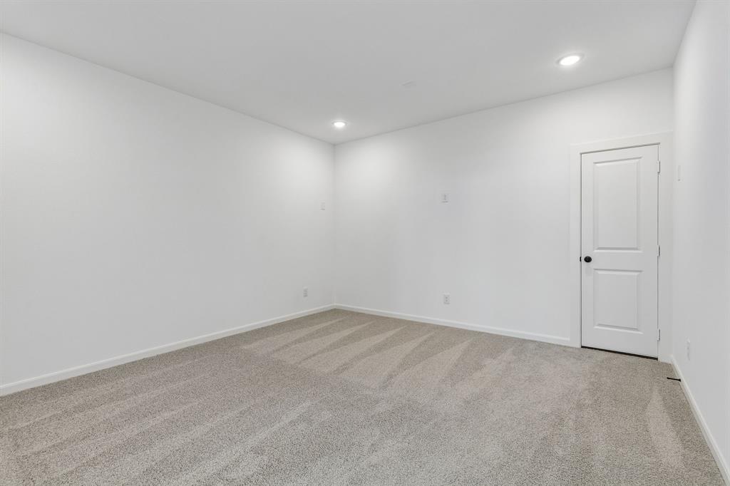 15852 Amber Street Frisco, TX 75033 - Photo 14 of 19 The spacious media room paired with adjacent game room creates the ultimate family entertainment zone!