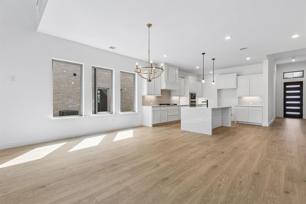 15852 Amber Street Frisco, TX 75033 - Photo 5 of 19 Whether it's grand dinner parties or cozy family meals, this dining room is perfect for any occasion!