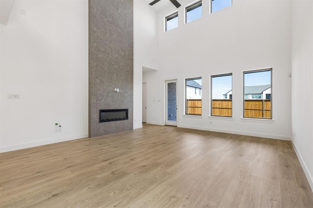 15852 Amber Street Frisco, TX 75033 - Photo 6 of 19 Plenty of space to host family and friends in this outstanding family room!
