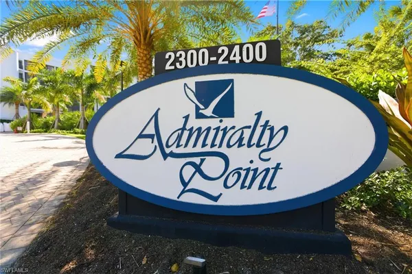 a view of a wooden sign board