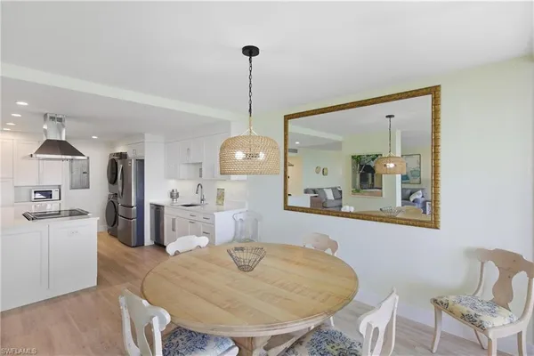 a view of a dining room with furniture