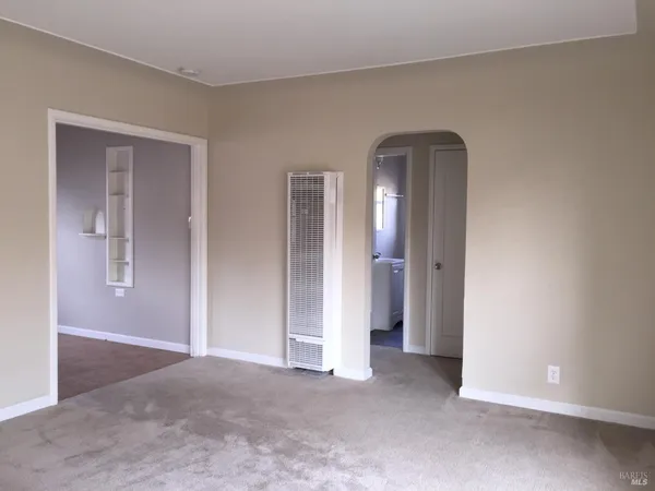 a view of empty room with closet