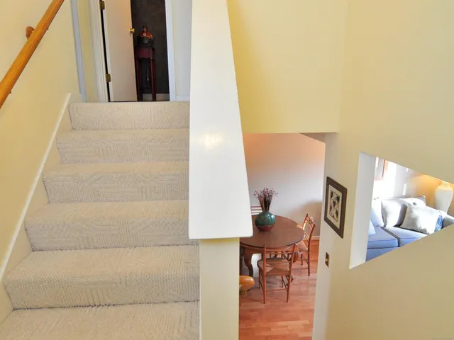 a view of living room with furniture and rug