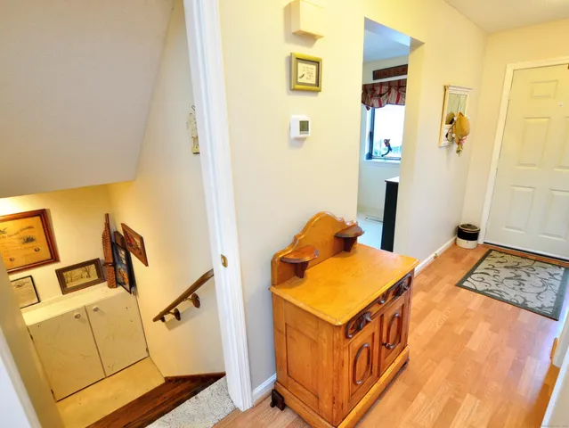 a view of a livingroom with furniture and a garage
