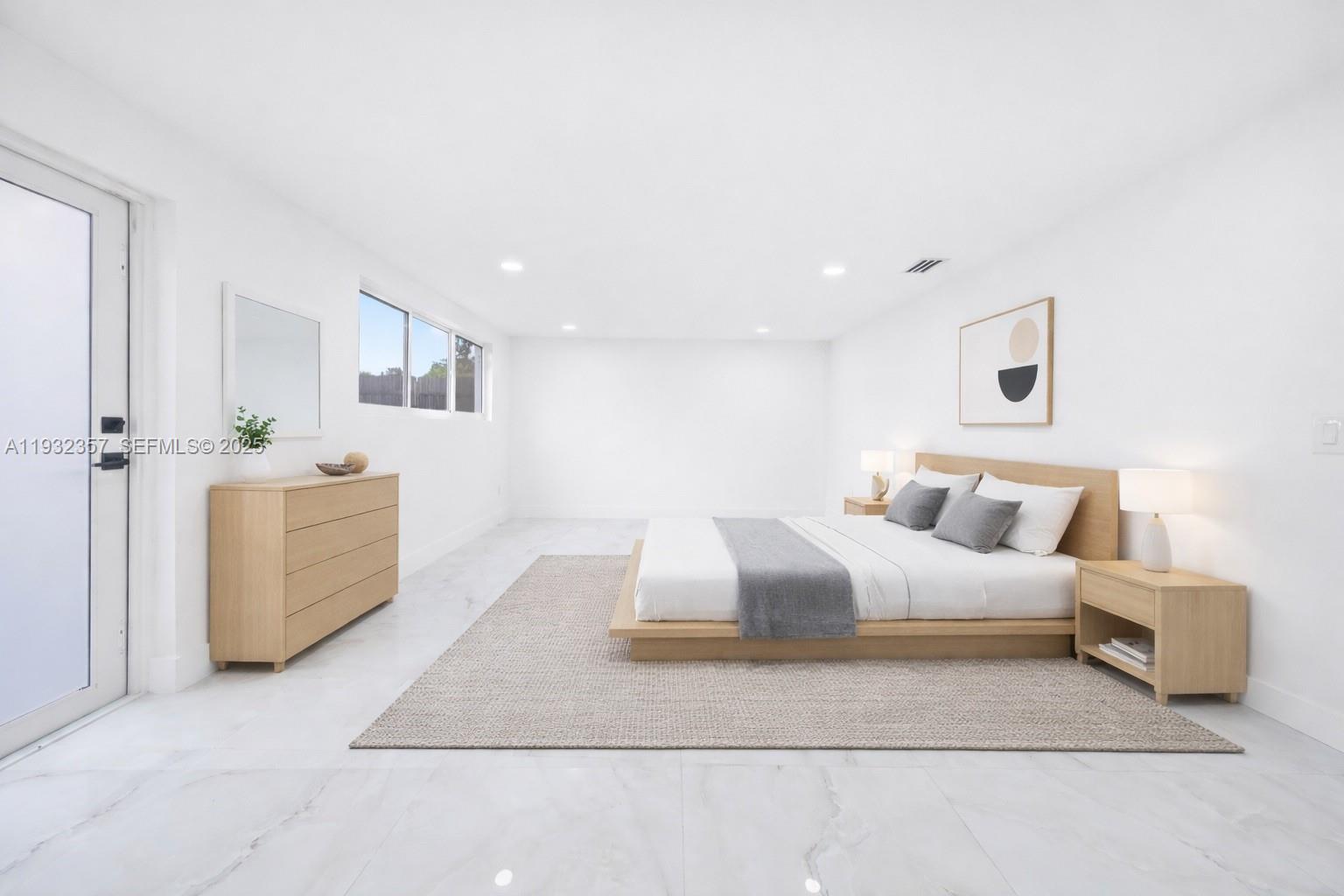 4140 Southwest 108th Avenue Miami, FL 33165 - Photo 17 of 51 a bedroom with a bed and a couch