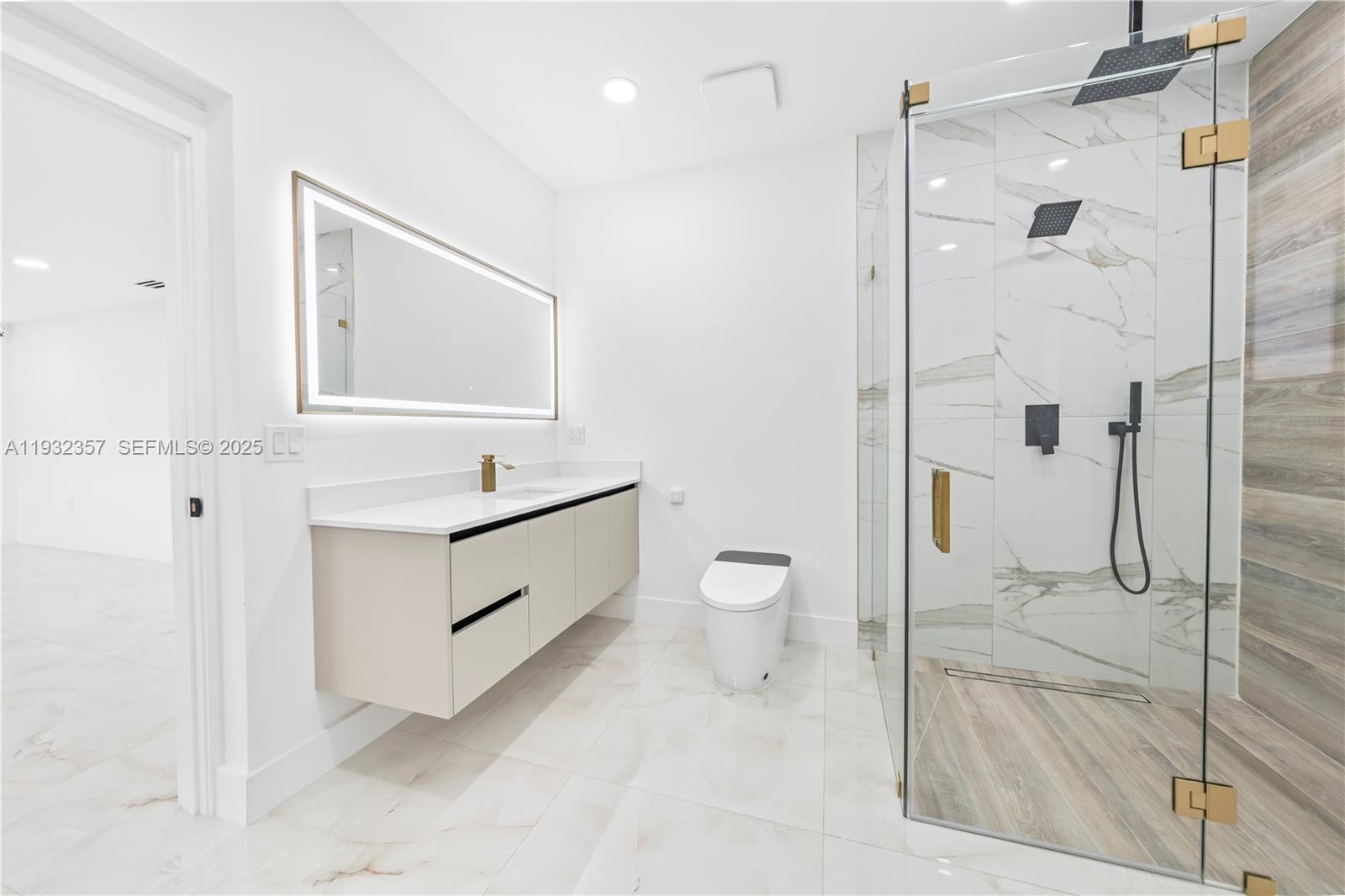 4140 Southwest 108th Avenue Miami, FL 33165 - Photo 40 of 51 a spacious bathroom with a shower sink and toilet