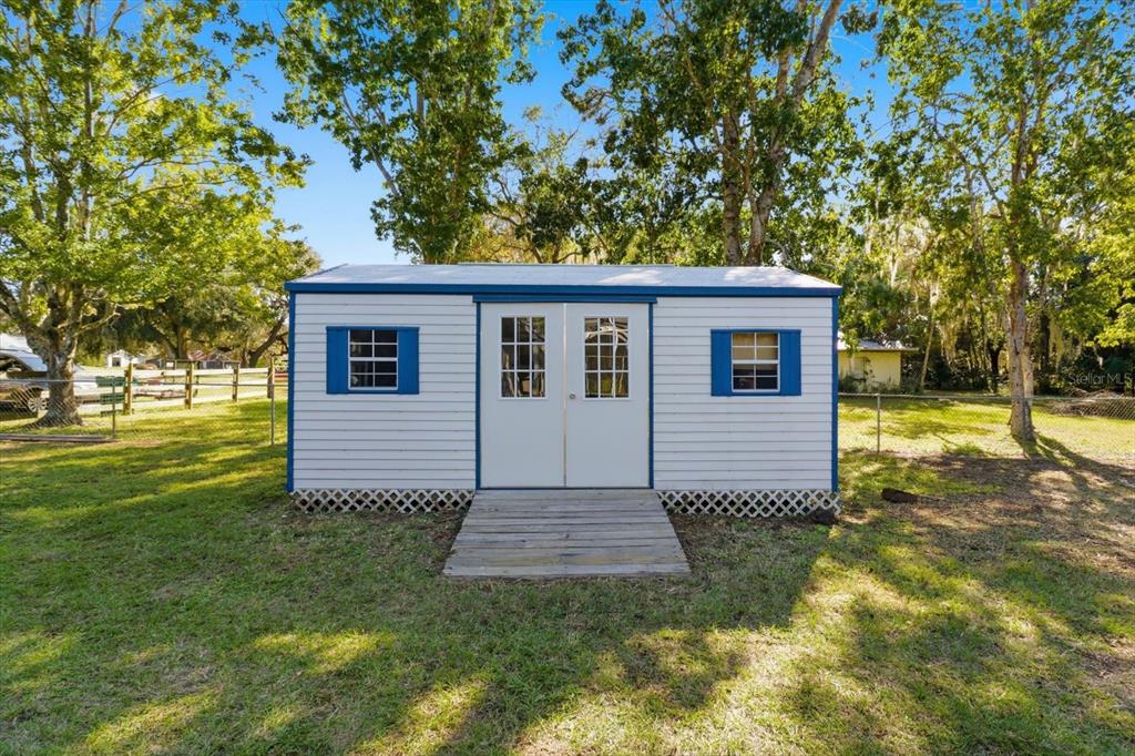 3030 South Bay Berry Point Inverness, FL 34450 - Photo 35 of 45 a view of a house with a yard