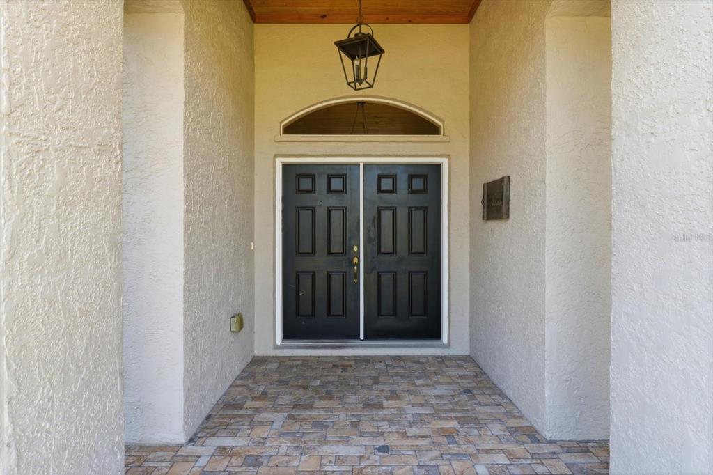 3030 South Bay Berry Point Inverness, FL 34450 - Photo 5 of 45 a view of a hallway with a door