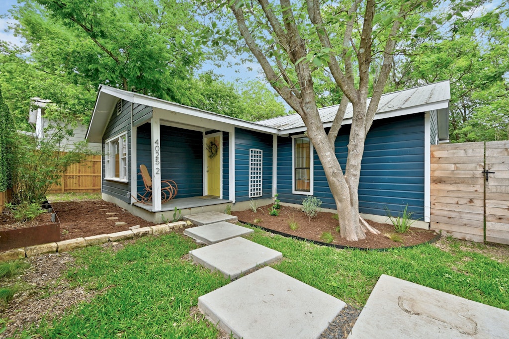4025 Valley View Road, Unit 2 Austin, TX 78704 - Photo 1 of 19 a view of a house with a yard and large tree