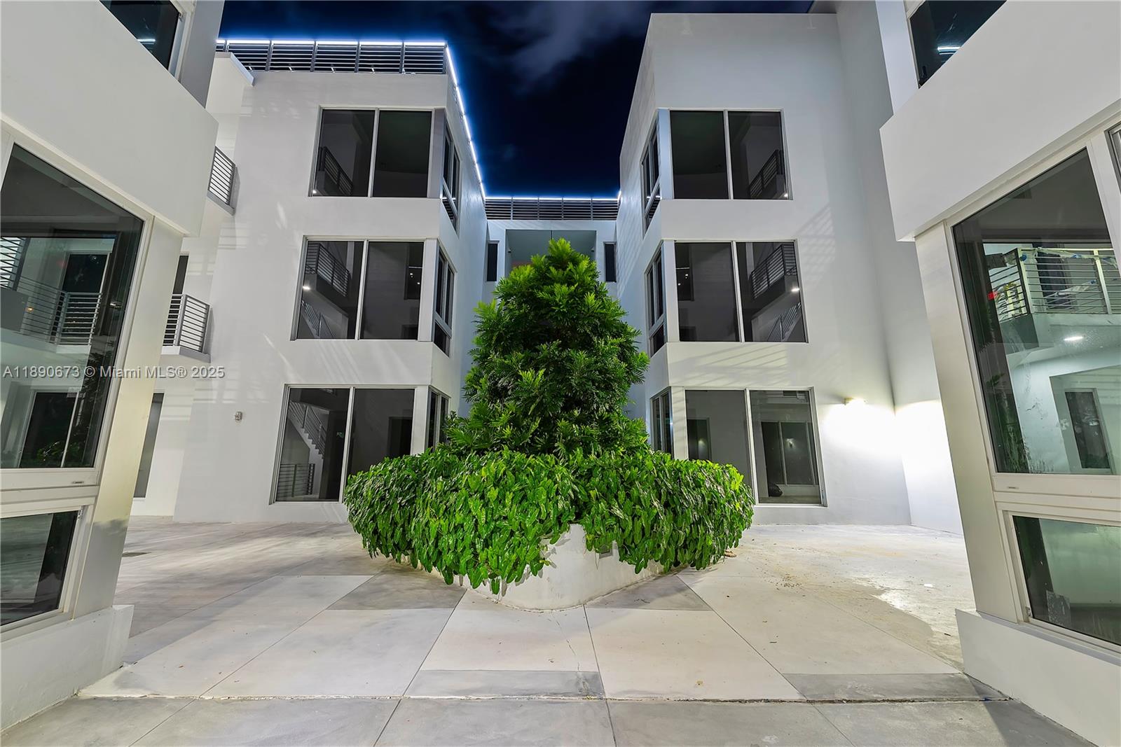 529 Southwest 11th Street, Unit 203 Miami, FL 33129 - Photo 19 of 24 a house with a window and balcony