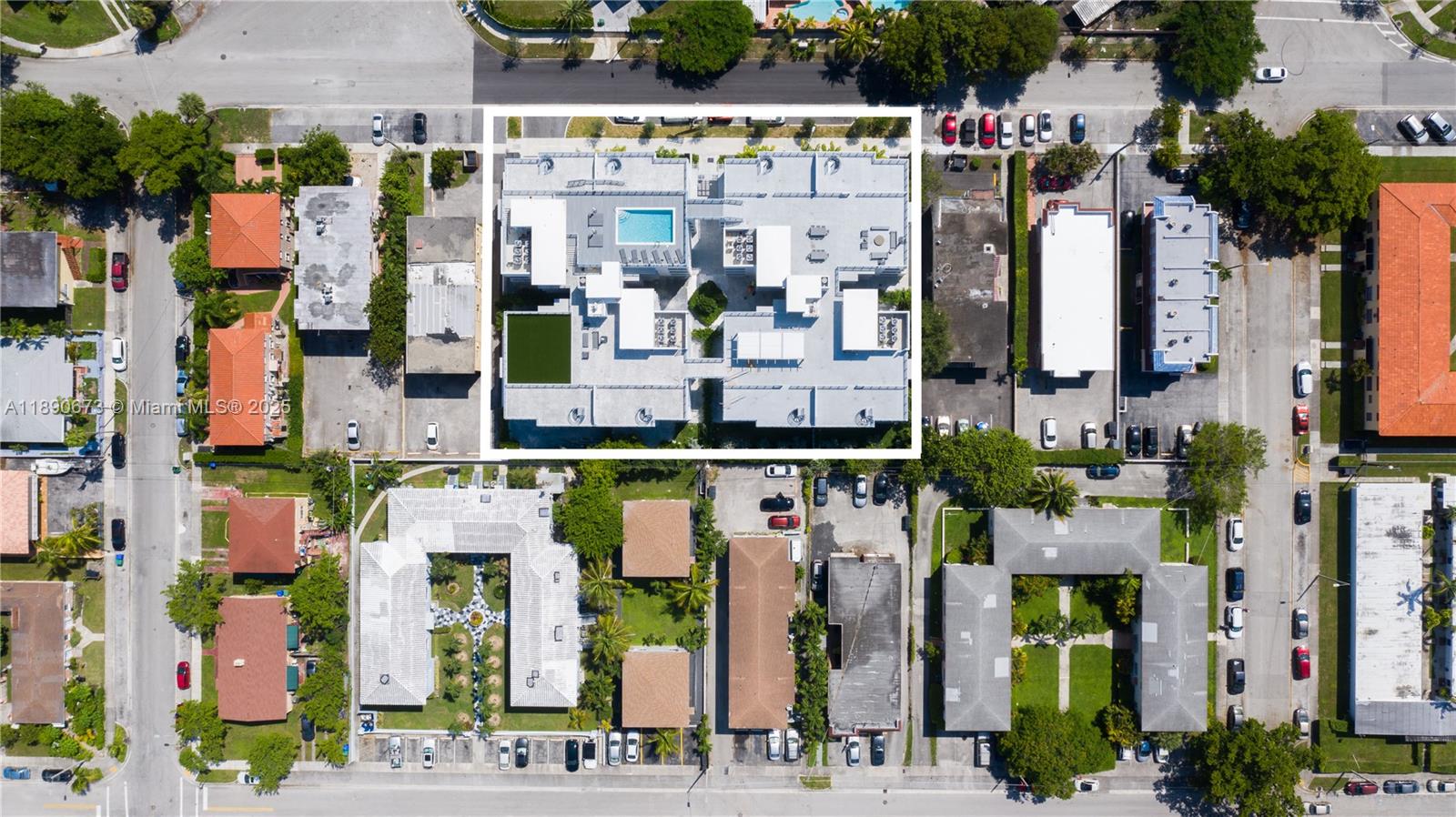 529 Southwest 11th Street, Unit 203 Miami, FL 33129 - Photo 22 of 24 an aerial view of multi story residential apartment building with yard