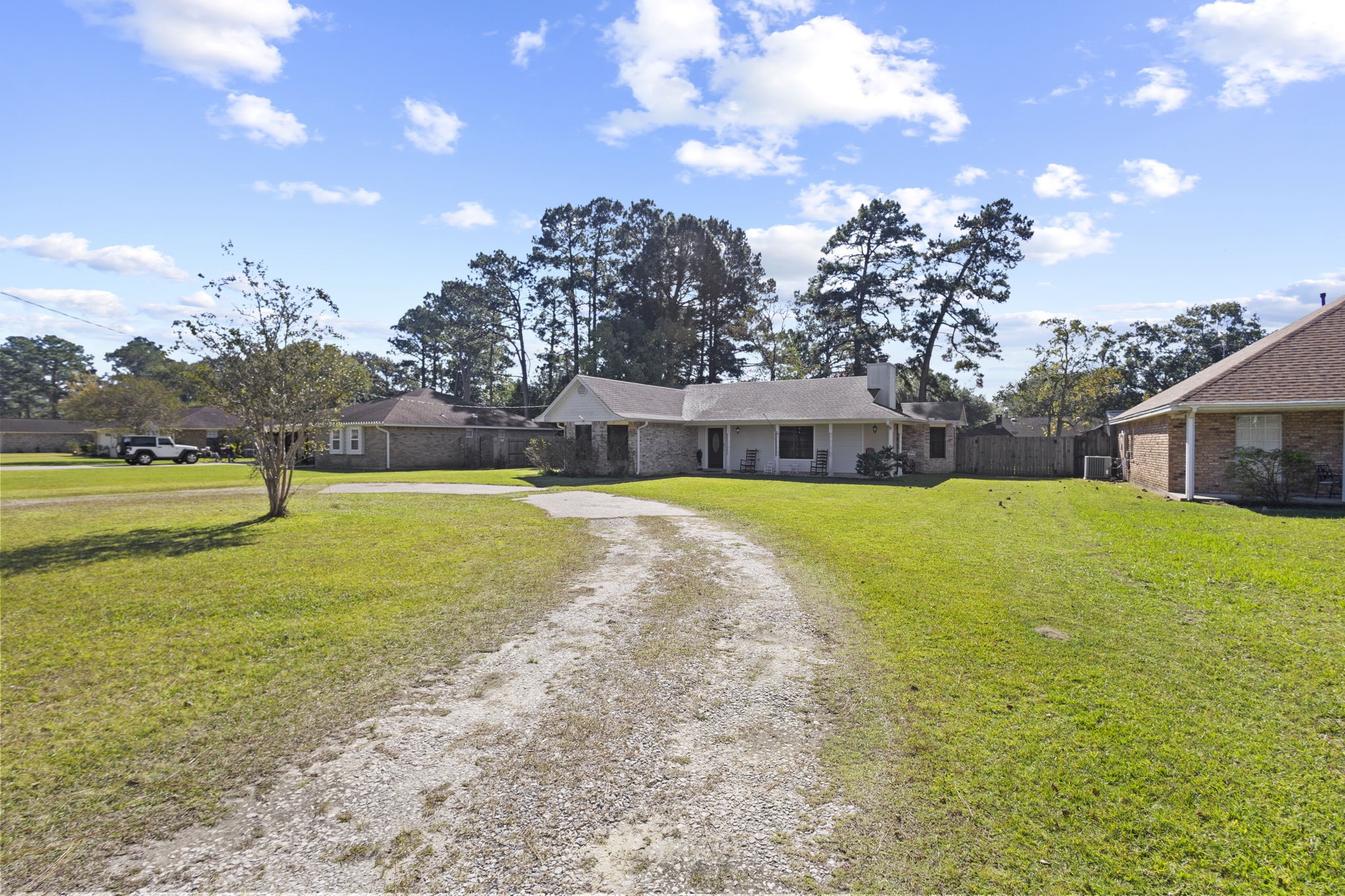 125 Williams Road Lumberton, TX 77657 - Photo 19 of 22 a view of a house with a yard