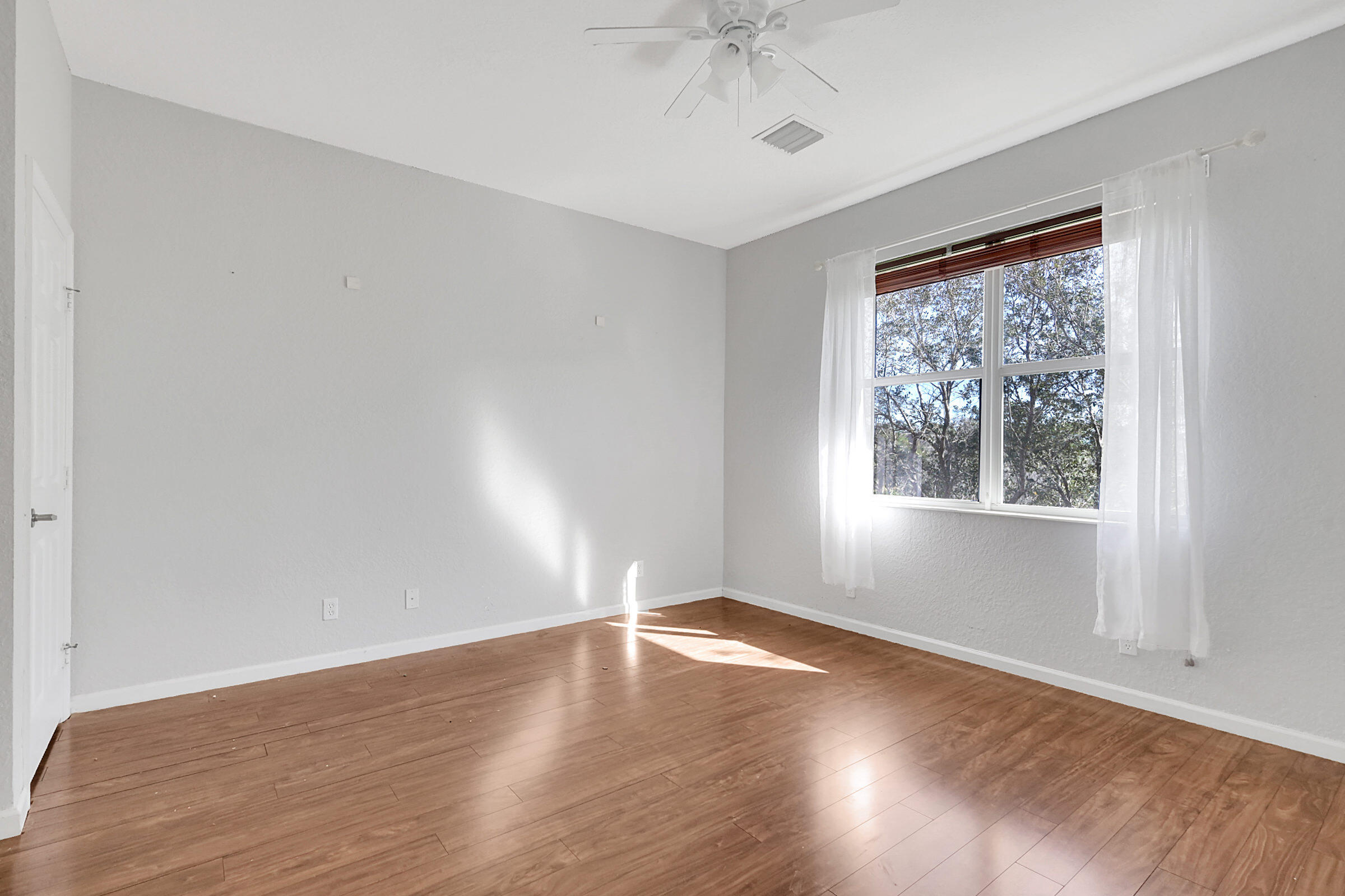 412 Southeast Bloxham Way Stuart, FL 34997 - Photo 20 of 35 Master Bedroom