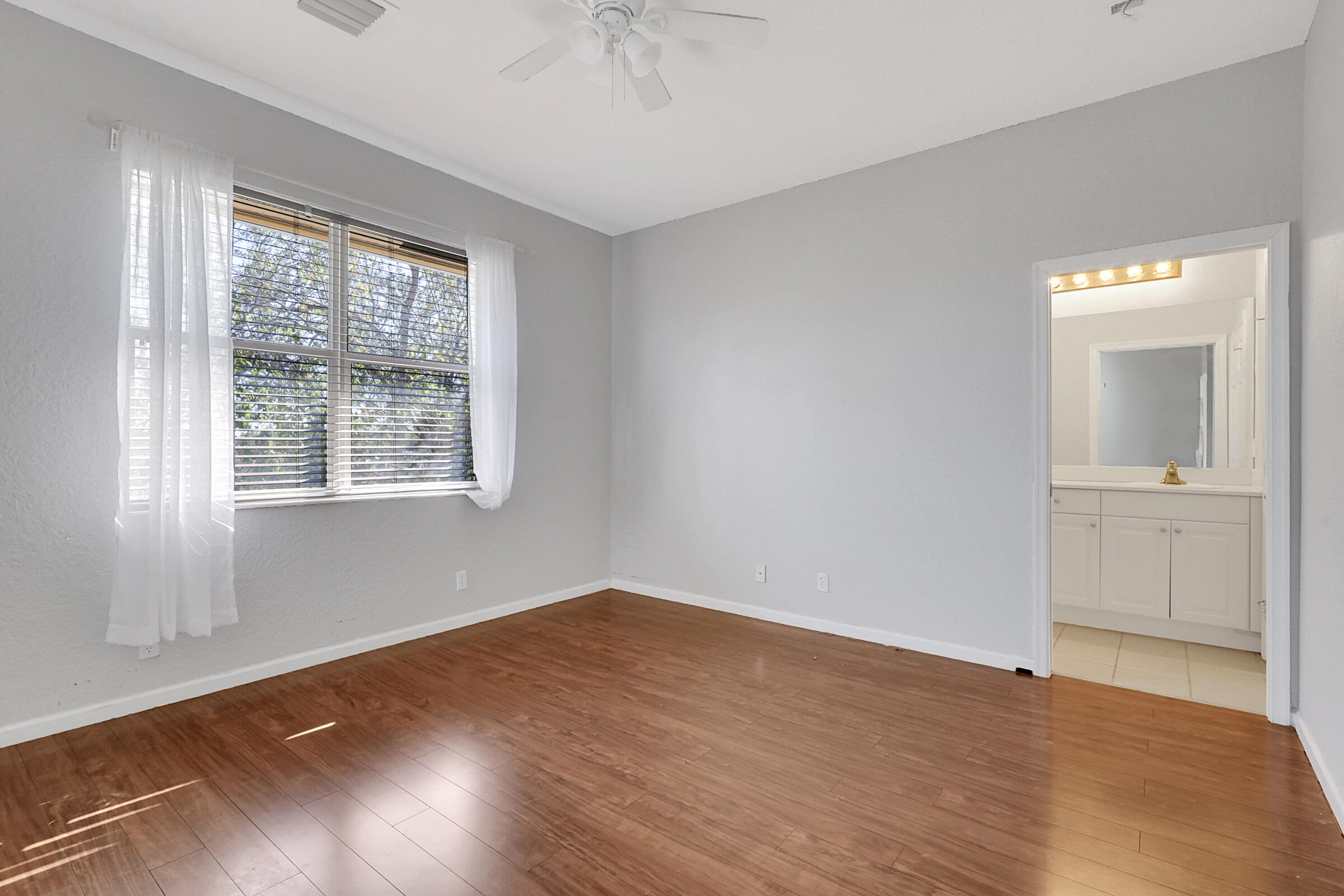 412 Southeast Bloxham Way Stuart, FL 34997 - Photo 21 of 35 Master Bedroom