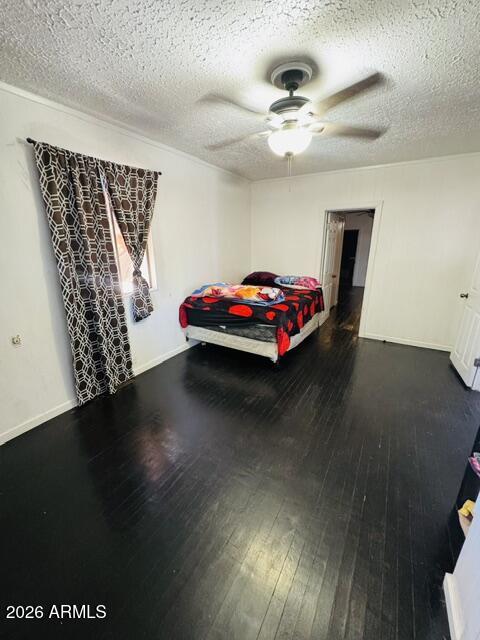 701 6th Green Street Douglas, AZ 85607 - Photo 8 of 10 a living room with furniture and a wooden floor