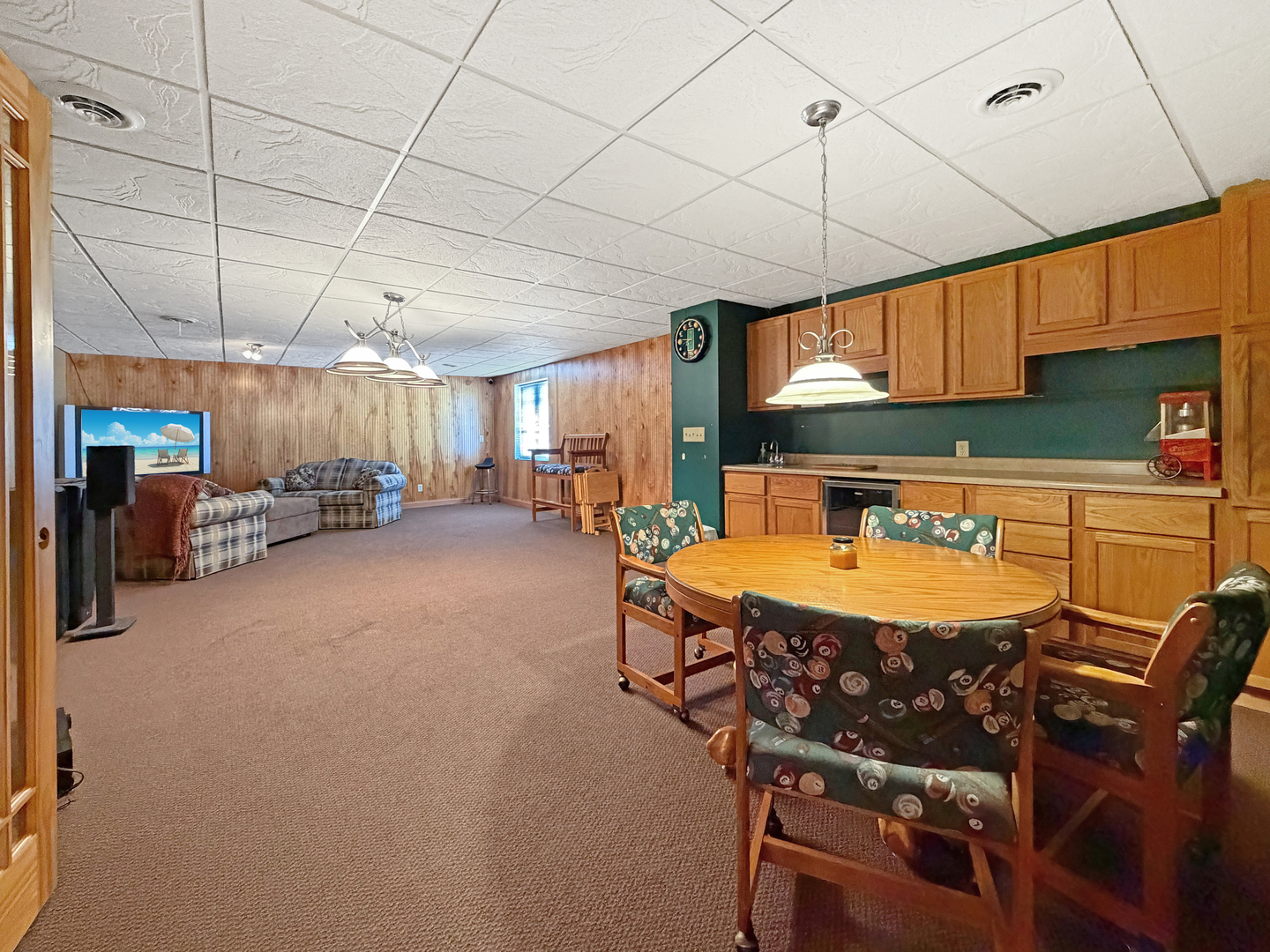 222 West Exchange Street Freeport, IL 61032 - Photo 14 of 46 a dining room with furniture and a chandelier