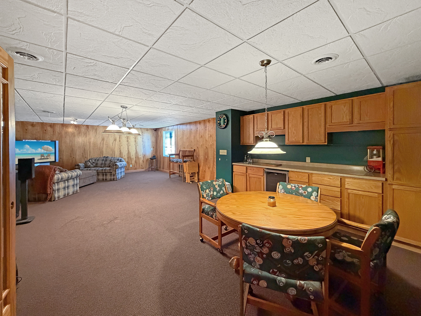 222 West Exchange Street Freeport, IL 61032 - Photo 16 of 46 a kitchen with stainless steel appliances granite countertop a sink a stove a refrigerator cabinets and chairs