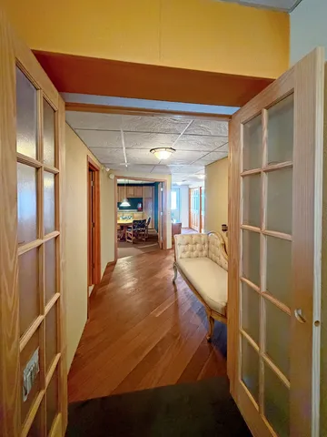 a view of a bedroom with window and furniture