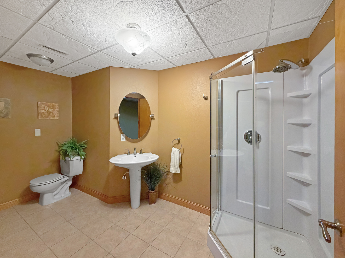 222 West Exchange Street Freeport, IL 61032 - Photo 24 of 46 a bathroom with a toilet sink and shower