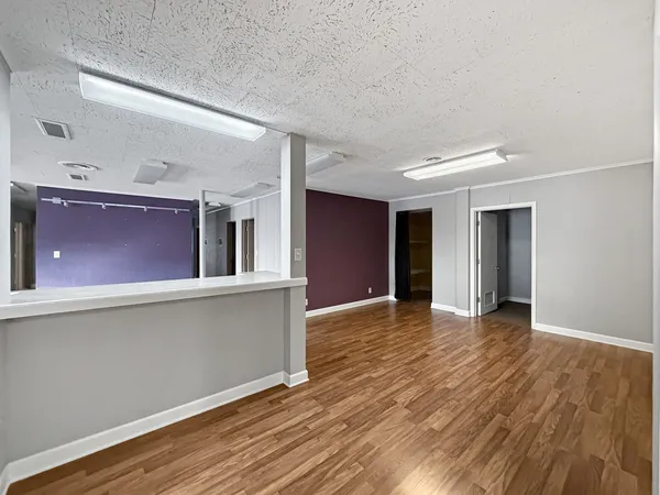 a view of hallway with a couch