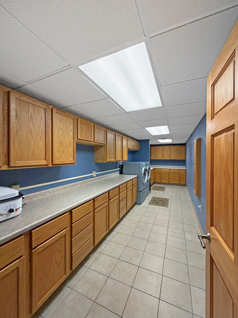 222 West Exchange Street Freeport, IL 61032 - Photo 36 of 46 a kitchen with stainless steel appliances a sink window and cabinets
