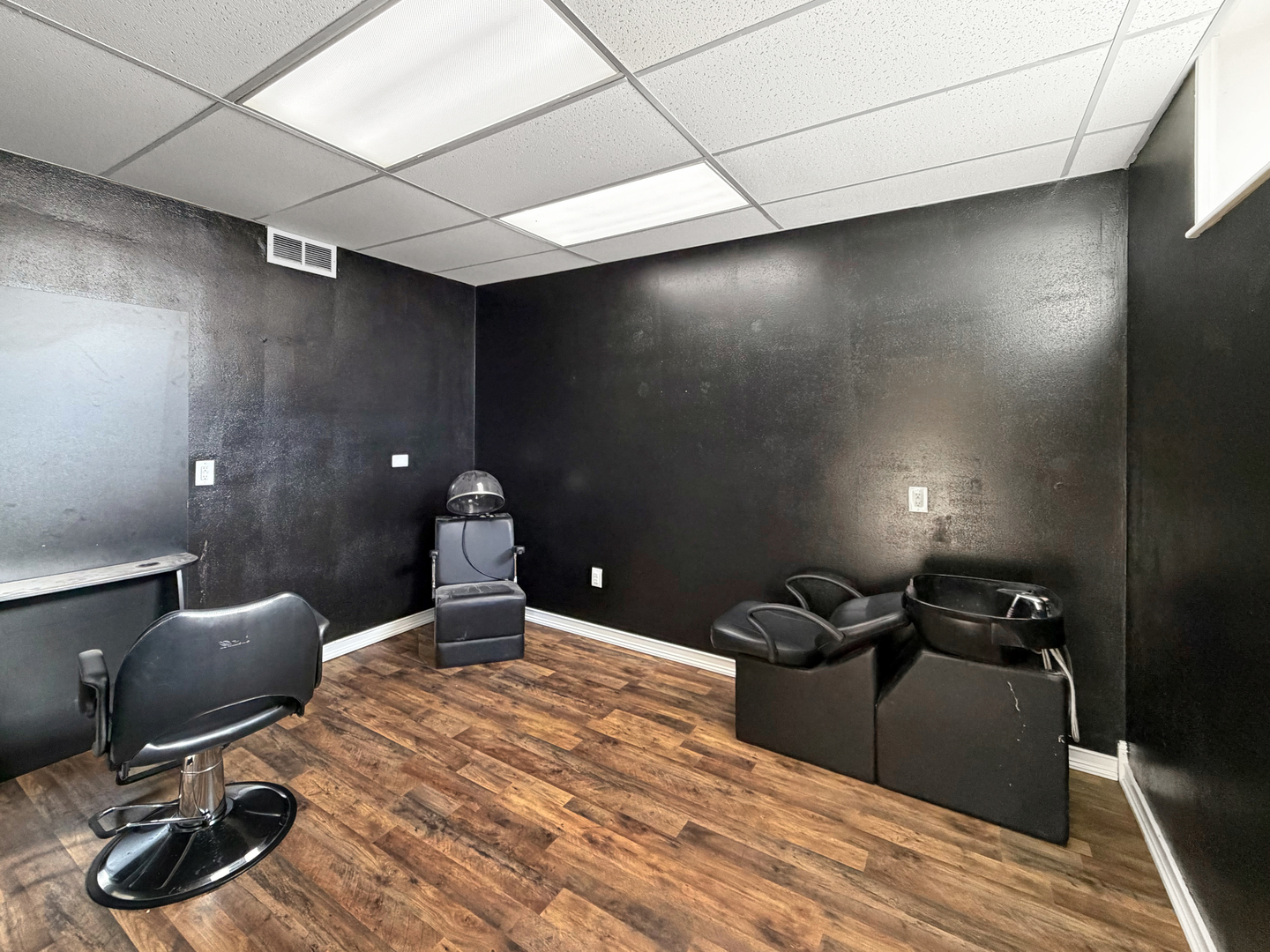 222 West Exchange Street Freeport, IL 61032 - Photo 39 of 46 a bedroom with a bed and wooden floor