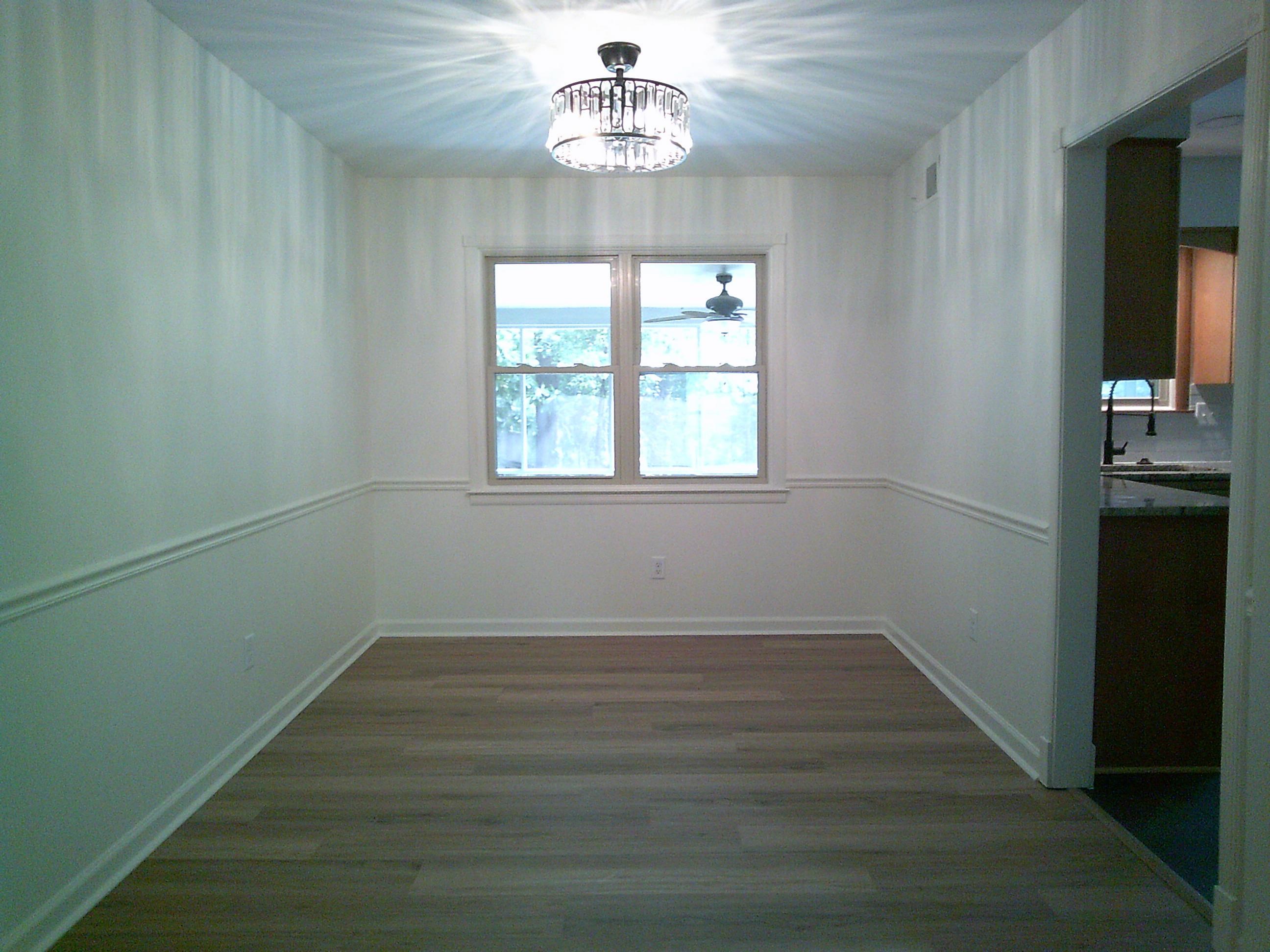 235 Morton Road Collierville, TN 38017 - Photo 5 of 18 wooden floor in an empty room with a window