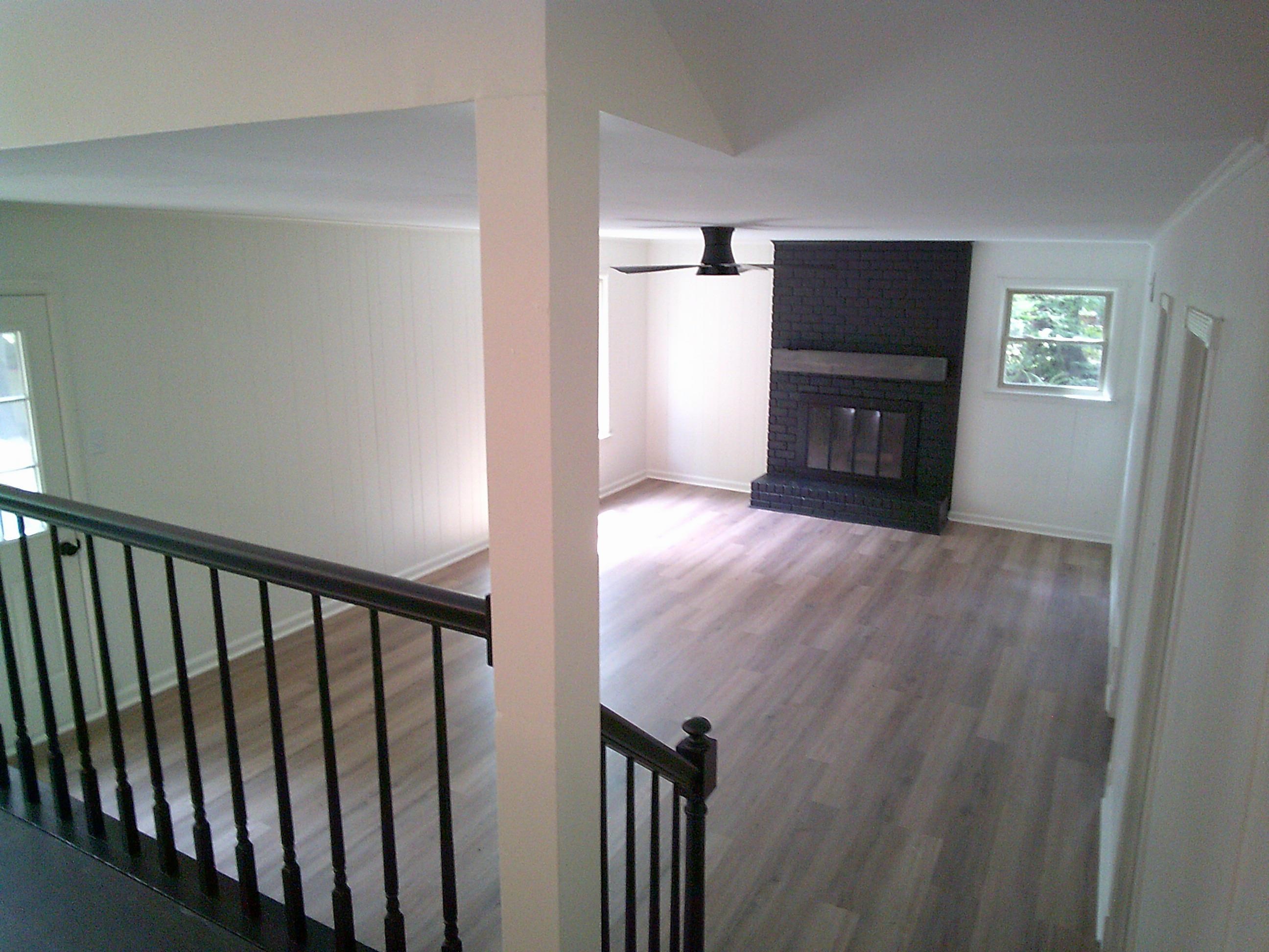 235 Morton Road Collierville, TN 38017 - Photo 7 of 18 a view of hallway with wooden floor and a window