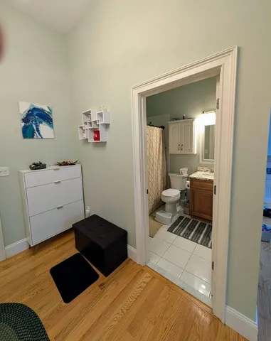 a bedroom with a bed and a cabinets