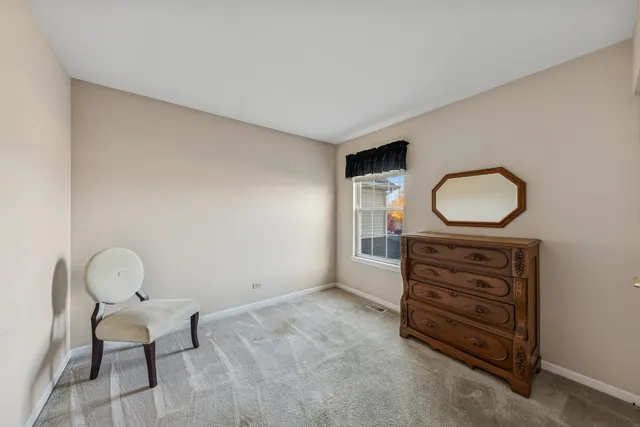 a view of a livingroom with furniture