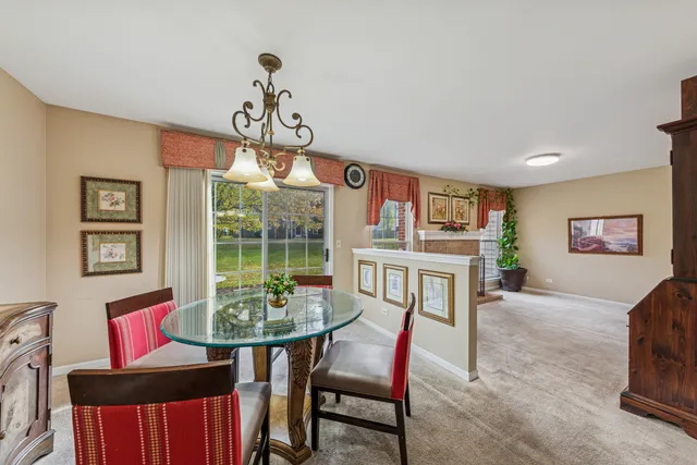a view of a livingroom with furniture and window