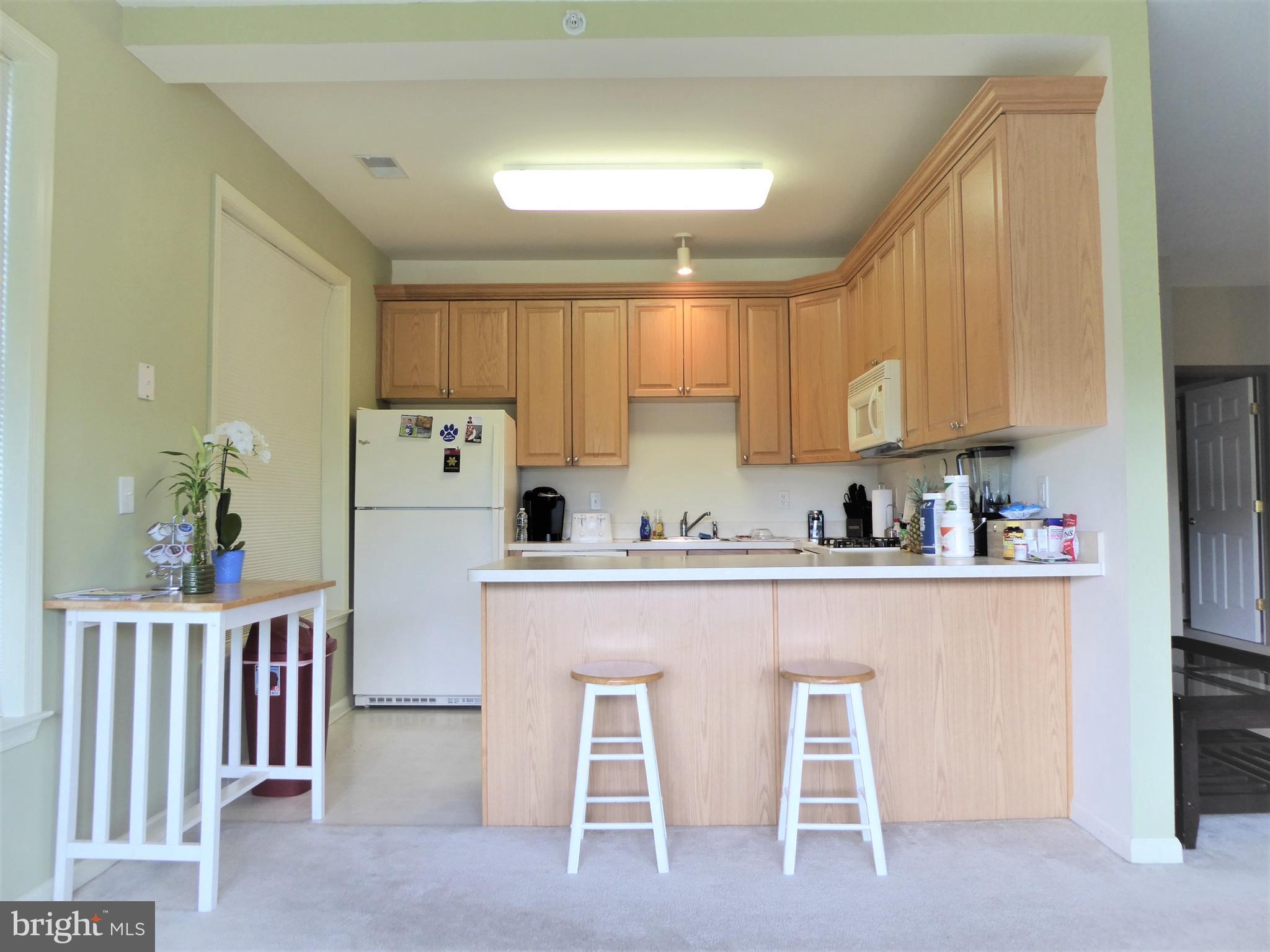 21 Kyle Way Ewing, NJ 08628 - Photo 9 of 22 Hang out at the kitchen peninsula!