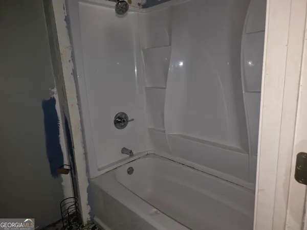 a bathroom with a bathtub