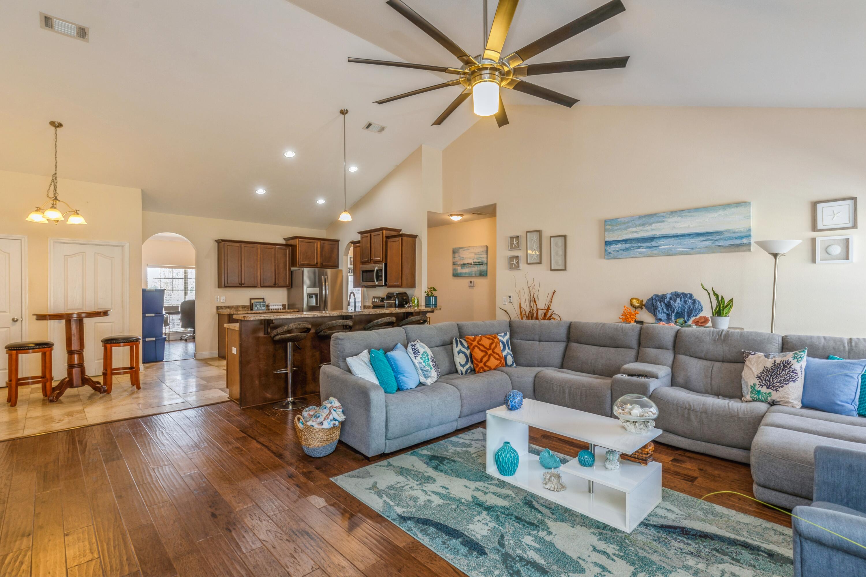 609 Rowan Circle Crestview, FL 32536 - Photo 12 of 37 a living room with furniture and kitchen view
