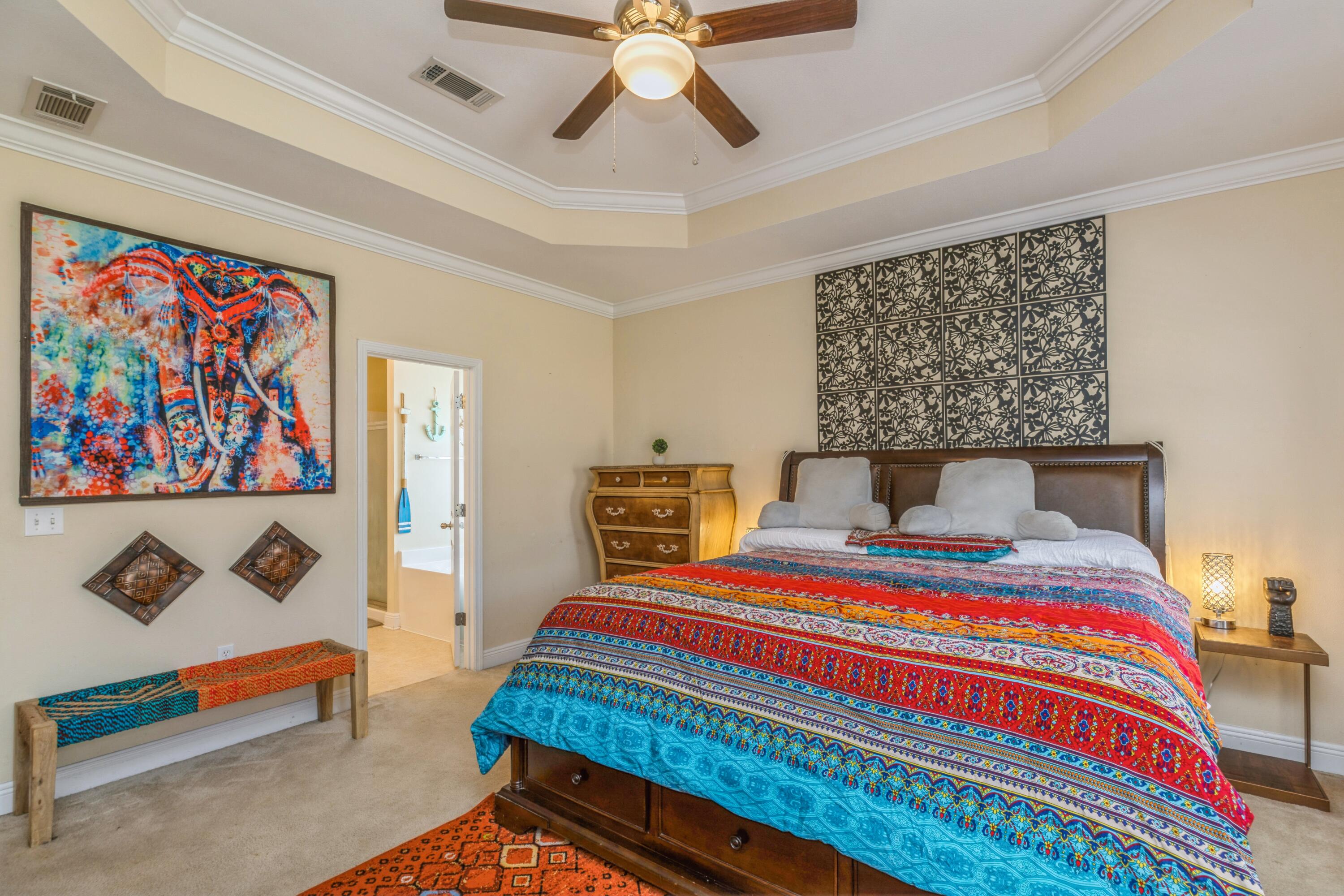 609 Rowan Circle Crestview, FL 32536 - Photo 29 of 37 a bedroom that has a bed and a table in it
