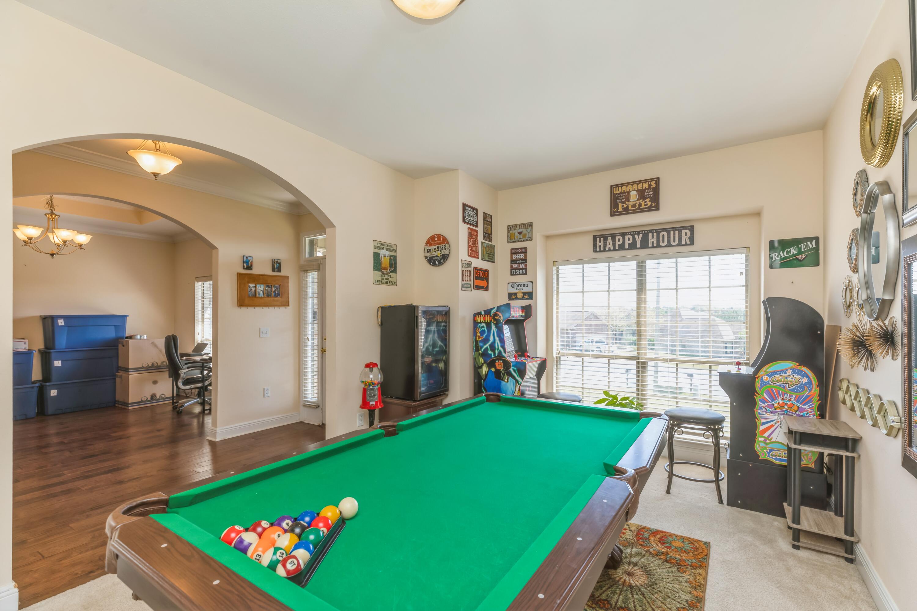 609 Rowan Circle Crestview, FL 32536 - Photo 8 of 37 a room with pool table and windows