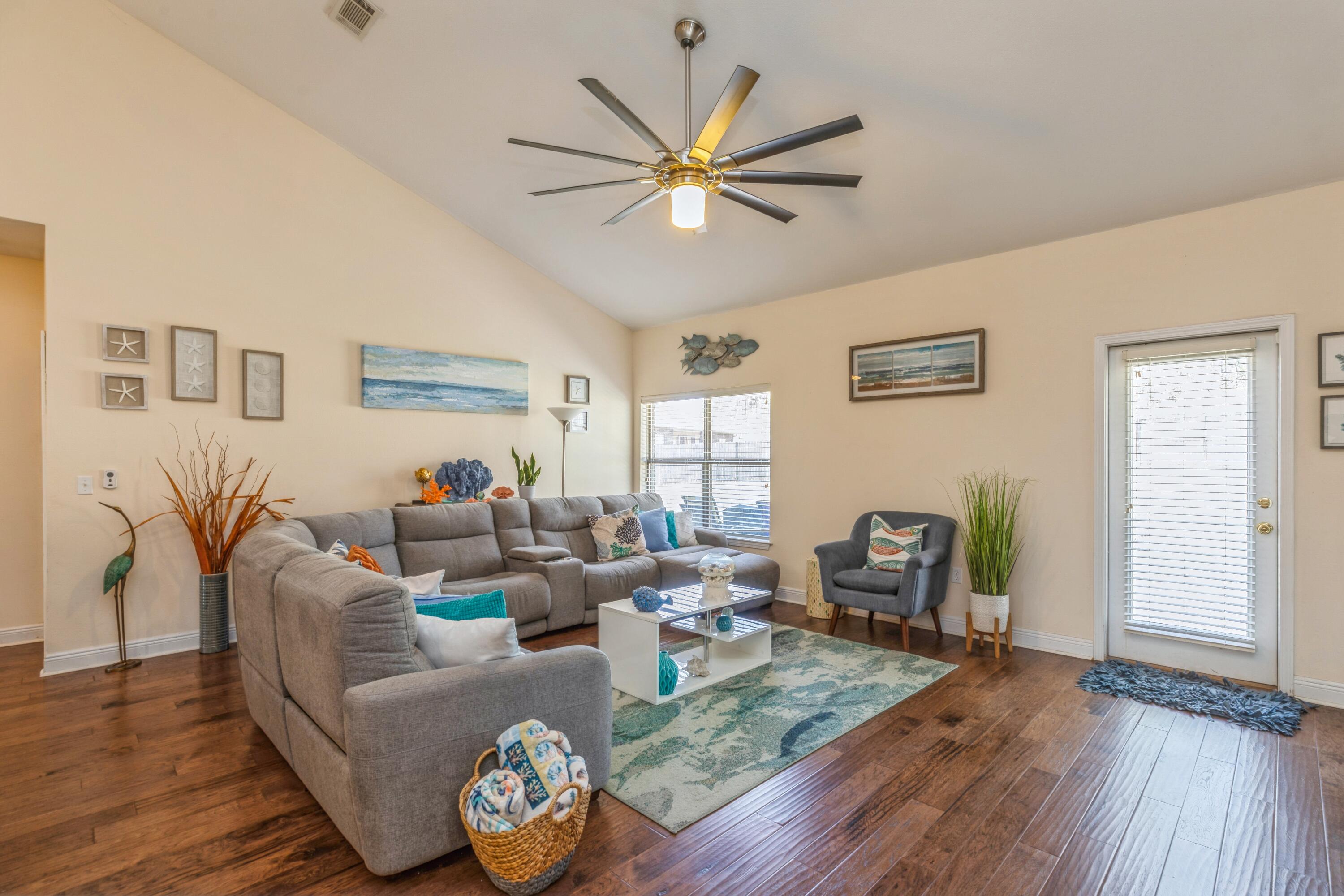 609 Rowan Circle Crestview, FL 32536 - Photo 10 of 37 a living room with furniture and wooden floor